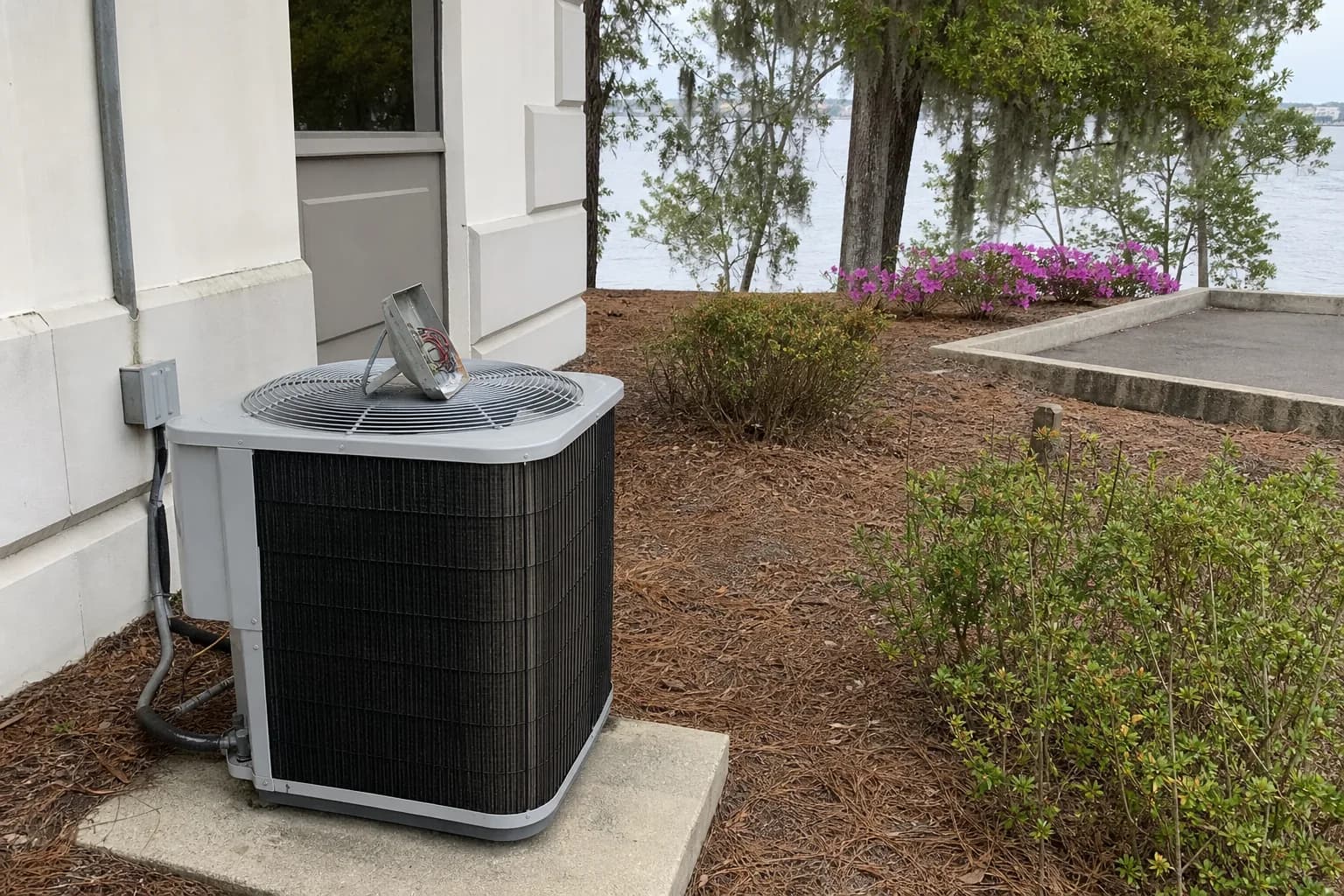 HVAC unit on an after-hours call at a Daphne Mobile Bay home, install detail, spring