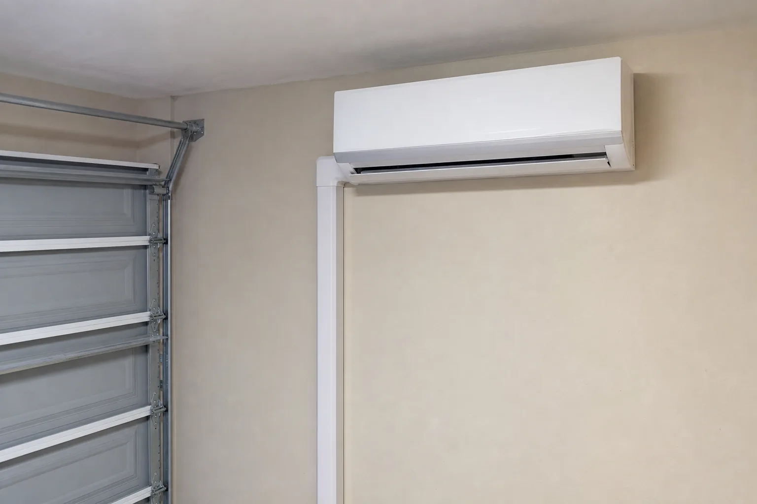 Newly installed ductless mini-split in a Magnolia Springs home garage, service view