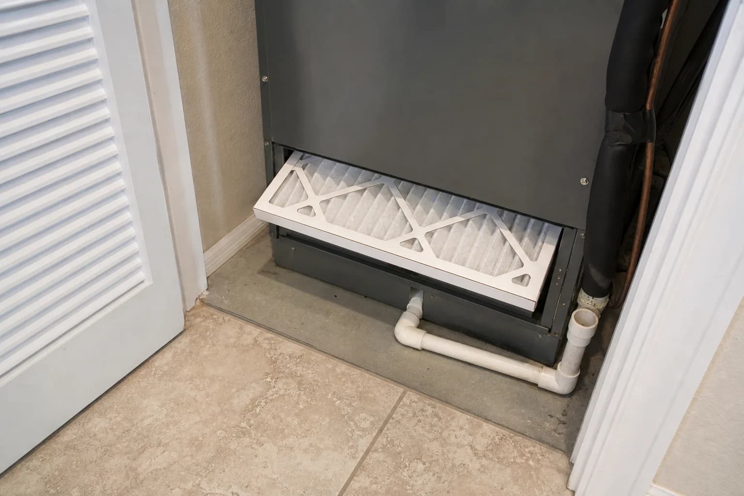 Indoor air handler and filter in a Silverhill home interior wall, interior view