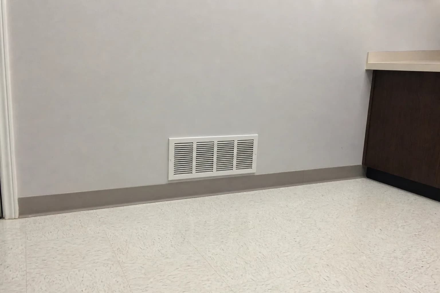 Indoor air handler and filter in a Spanish Fort home back room, indoor detail