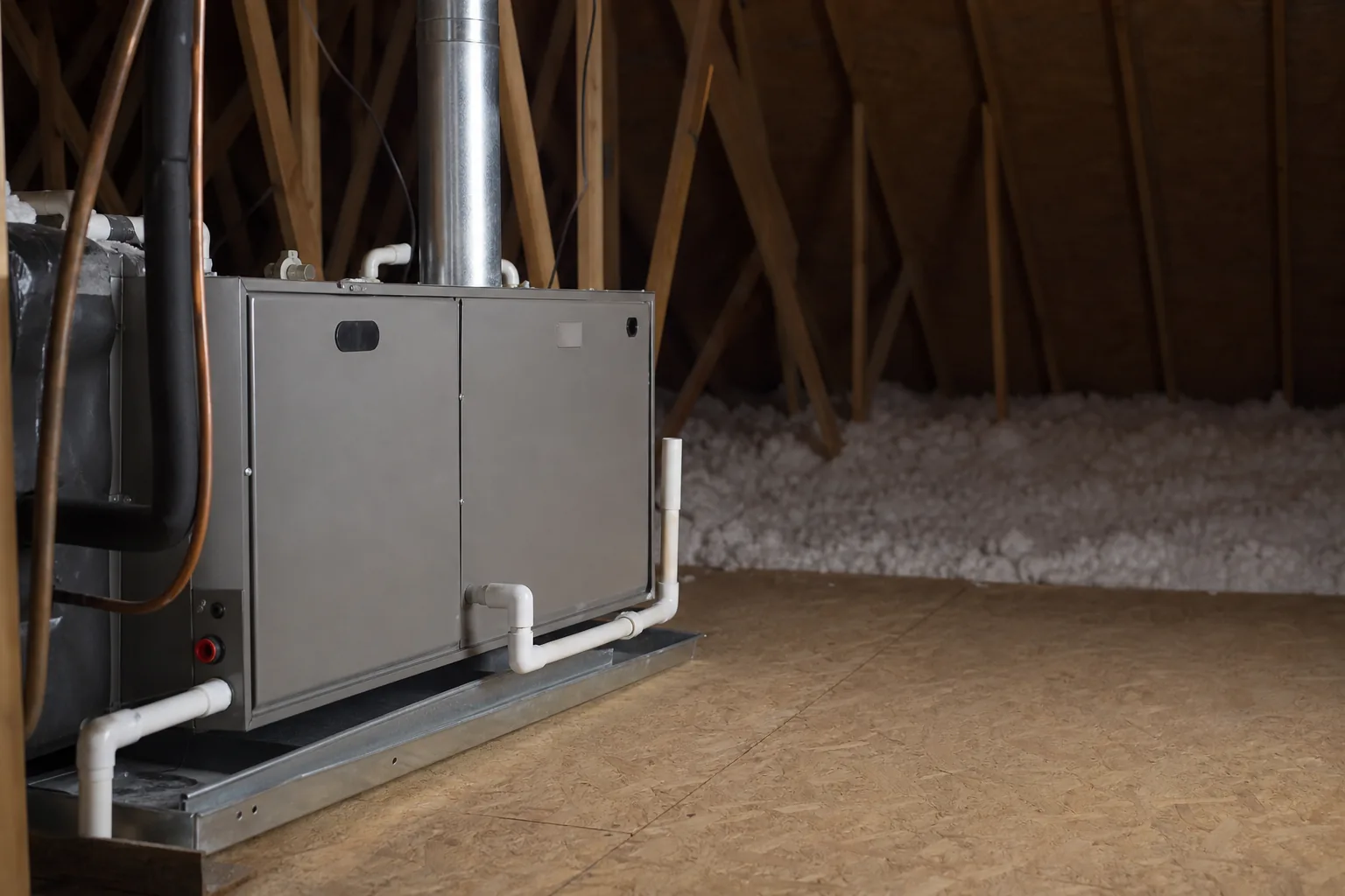 Indoor HVAC unit on an after-hours call in a Stockton home attic, interior view