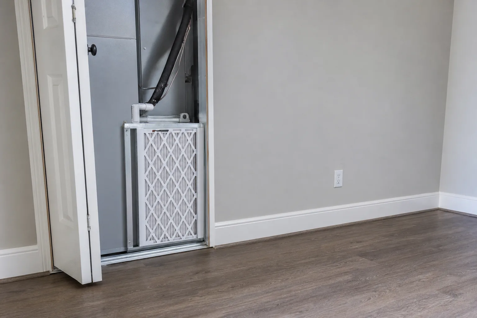 Indoor air-quality equipment in a Loxley home bonus room, fresh-filter view