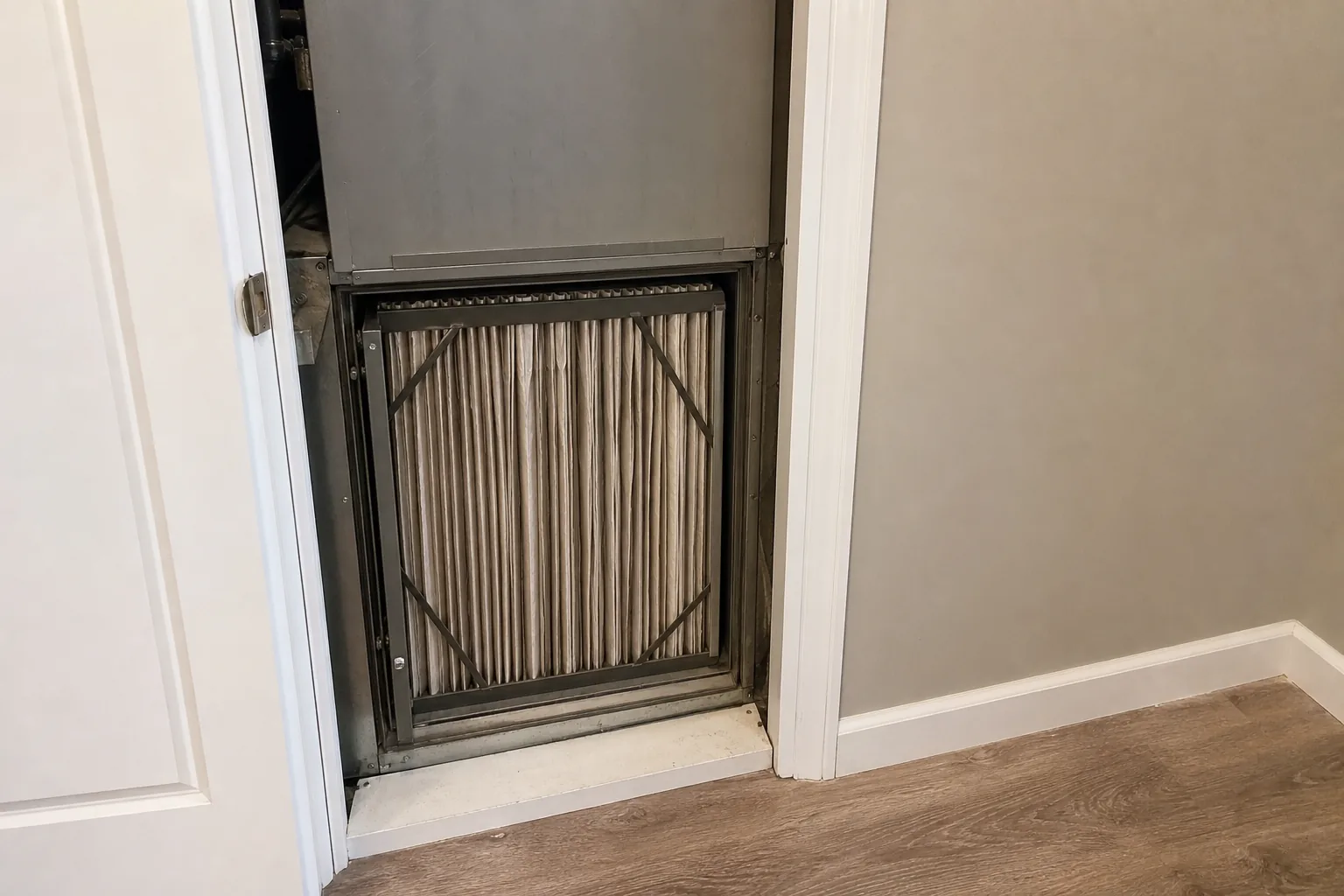 Indoor air-quality equipment in a Bay Minette home bonus room, plenum detail