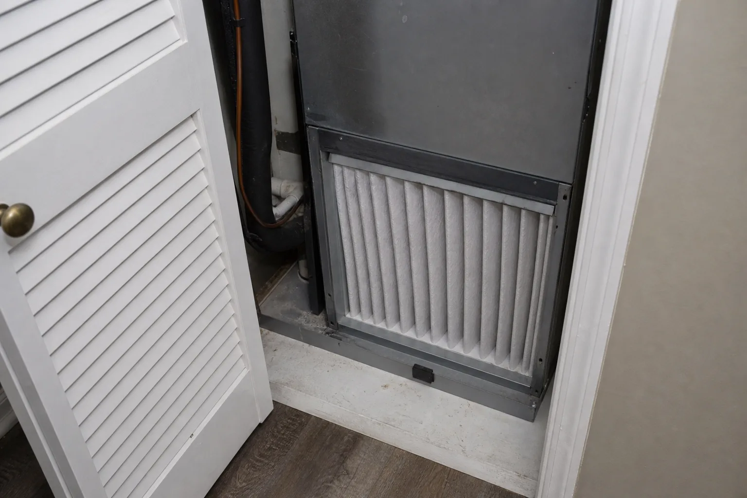 Indoor air-quality equipment in an Elberta home interior wall, duct detail