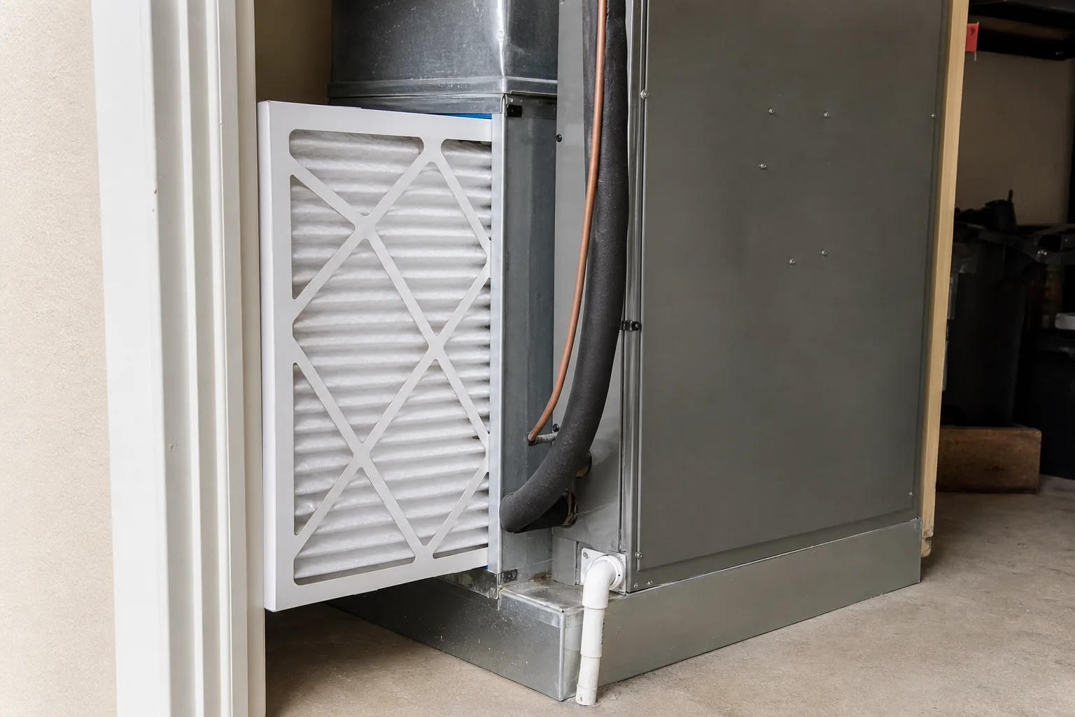 Indoor air handler and filter in a Stapleton home back room, comfort-control view